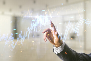 Poster - Multi exposure of man hand working with abstract financial diagram and world map on blurred office background, banking and accounting concept