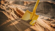 Photo Shovel Placed On A Pile Of Sand For Construction Work It Is Used For Scooping Sand