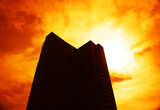 Fototapeta Nowy Jork - Silhouette of sunset city building centered illustration