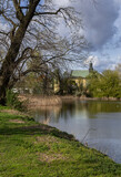 Fototapeta  - Church in Raszyn, view from the Raszyńskie ponds, Masovia, Poland