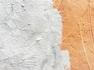 Wall Mural - surface of an old wall painted with gray paint over terracotta paint