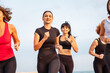 Group of jogging Caucasian women. Young Caucasian smiling woman is sport clothes. Concept of healthy lifestyle and cardio fitness