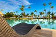Swimming pool and palm trees in luxury resort at Pun Cana in the Dominican Republic