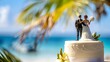 Wedding cake with figurines of groom carrying bride on a destination wedding on a tropical beach paradise
