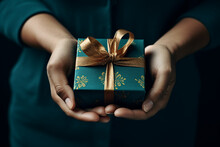 Hand Holding A Present Box With Gold Bow On Dark Background, In The Style Of Dark Teal And Dark Indigo сreated With Generative Ai