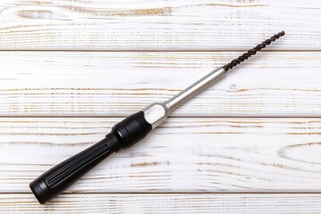 Poster - Close Up Screwdriver on Wooden Surface