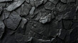 Background of a wall made of black stone