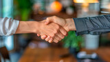 Fototapeta Miasto - Close Up of Two People Shaking Hands. Generative AI