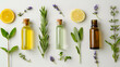 © Yuri - Various essential oils and herbs in bottles on table