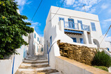 Fototapeta  - View of narrow street with white houses in Apollonia village, Sifnos island, Greece