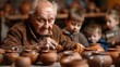 Elderly man educates kids in pottery at a studio, molding clay for an artistic learning experience