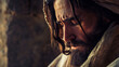 An emotional portrayal of Jesus praying fervently in a dimly lit room, his face etched with intensity and devotion, conveying the depth of his spiritual struggle and reliance on di