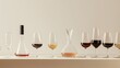 A minimalist flatlay composition of sleek wine glasses and decanters, highlighting the custom of enjoying fine wines during the festive meals of Shavuot.