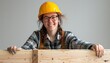 Happy Female Carpenter with Safety Helmet at Workbench, Cheerful Builder in Workshop, Copy Space