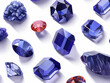 Illustration of various gemstones with different cuts isolated on a white background.
