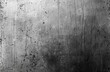 A detailed shot of a weathered metal surface, with scratches and wear, ideal for grunge-style backgrounds or texture overlays.