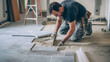 © Vitor - Homem colocando azulejo no chão