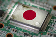 Computer chip on PCB board with Japan flag