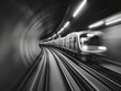 A train is traveling through a tunnel. The tunnel is curved and the train is moving quickly. The train is surrounded by darkness, which creates a sense of mystery and suspense