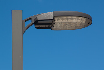 Poster - Lamp post against a blue sky