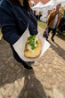 Fried baguette in vegetable oil with garlic sauce and green onions. Street food.