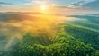 Beautiful sunrise over the lush mountains, aerial view of the forest trees, concept of a healthy rainforest ecosystem and environment background, texture of the green forest seen from above.