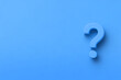 Blue background with text space and a 3D question mark