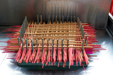 Sticker - Close-up of neatly arranged incense sticks in a Chinese Buddhist temple