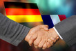 Ein Handschlag zwischen Deutschland und Frankreich