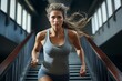 Active female running and exercising on staircase 