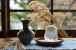 Rice wine and rice ear on table