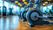 Blurred image of sports equipment in a modern gym. Concept Gym Equipment, Blurred Background, Modern Interior, Fitness Lifestyle, Active Lifestyle