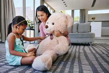 Wall Mural - Woman, child and play doctor in house, healthcare and mother in family home with teddy. Girl, stethoscope and learning medical care, heartbeat and education for wellness for childhood development