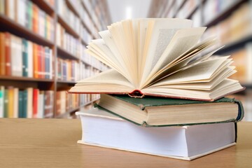 Sticker - Book stack on the desk in public library