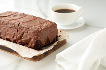 Wall Mural - Fresh homemade chocolate sponge cake on wooden board