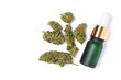 CBD oil (Marijuana oil) and marijuana buds (Cannabis flower) isolated on white background, top view, flat lay.