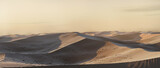 Fototapeta Góry - Panorama view to colorful sand dunes in the evening light. 3D Rendering