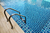 Fototapeta Mapy - Stainless steel swimming pool ladder.
