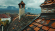 beautiful city views seen from the roof of the house. city ​​and sunset and mountains from far away