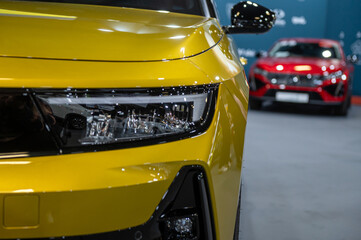 Wall Mural - Close-up of the headlights of a modern luxury car. Selective focus.