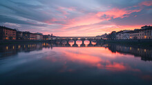 A Bridge Over The Calm Arno River In Florence Italy