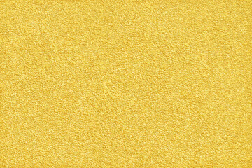 Wall Mural - surface and texture of fine mix size gravel gold wall background