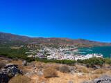 Fototapeta  - View of seaside town from the top of hill (Elounda, Crete, Greece)