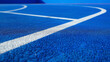 © 1cm - Vibrant Basketball Court with Crisp White Lines and Blue Background