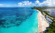 Aerial view of the beautiful Darkwood Beach at the Caribbean island of Antigua with turquoise sea and fine sand