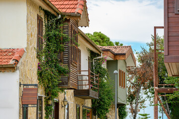 Sticker - Restored houses with bay windows on the historical streets of Side Antalya
