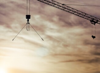 Poster - Silhouette of a dark construction crane with number 2024