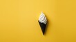 Vanilla soft serve ice cream cone on a vibrant yellow background