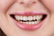 Macro photography of teeth with beautiful lips, showcasing veneers, smiling lips with teeth