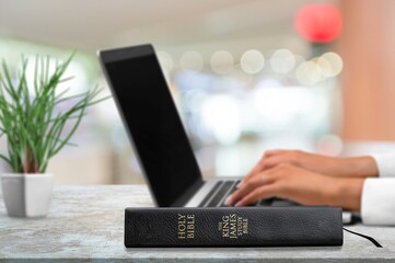 Canvas Print - Christian online concept. computer laptop and bible book